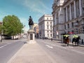 Earl Haig Memorial and police plus horse on Whitehall London