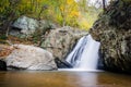 Early autumn color and Kilgore Falls, at Rocks State Park, Maryland. Royalty Free Stock Photo