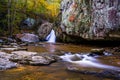 Early autumn color at Kilgore Falls, at Rocks State Park, Maryland. Royalty Free Stock Photo