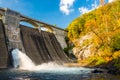 Early autumn color and Prettyboy Dam, on the Gunpowder River in Royalty Free Stock Photo