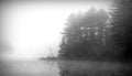 Beautiful early autumn morning fog on on Lake of Two Rivers in Algonquin Park, Canada Royalty Free Stock Photo