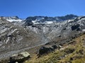 Early autumn remains of the alpine glacier Vardet da Grialetsch in the Albula Alps mountain massif, Zernez