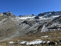 Early autumn remains of the alpine glacier Vardet da Grialetsch in the Albula Alps mountain massif, Zernez