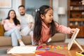 Asian Little Daughter Playing With Alphabet Board Learning At Home Royalty Free Stock Photo