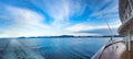 Early evening panoramic view of Dixon Entrance, BC from stern of cruise ship.