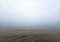 Early foggy morning over the calm Baltic Sea in Jurmala Royalty Free Stock Photo