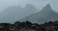 Early foggy and rainy morning shot of picturesque Dolomite Alps view near Tre Cime di Lavaredo formation in South Tyrol, Italy. Royalty Free Stock Photo