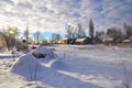 Early frosty morning in small ukrainian village with bokeh effect. Winter scenery