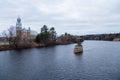 Early grey morning view of the 1911 neoclassical roman catholic St. Catherine church and cross on former Gouin bridge pillar Royalty Free Stock Photo