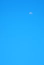 Early half moon clear blue autumn morning sky natural background Royalty Free Stock Photo