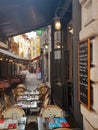 Restaurants in Cannes, France, with empty chairs and tables