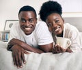 Early morning chilling. a young couple relaxing together at home. Royalty Free Stock Photo