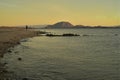 One person walks beach morning Baja, Mexico