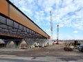 Early morning construction site of bridge over river