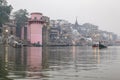 Early morning cremations take place at the ghats along the holy river Ganges in Varanasi, Benares, India