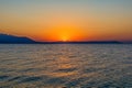 Early morning , dramatic sunrise over sea and mountain. Photographed in Asprovalta, Greece. Royalty Free Stock Photo