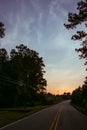 Early morning drive on a country road Royalty Free Stock Photo