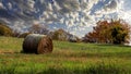 Early morning fall landscape with hay bales