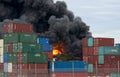 Fireball explosion at a West Footscray factory fire as seen from behind shipping containers. Melbourne, Victoria, Australia 30 Aug