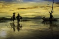 Early morning fishing boat ,Fishermen and kid fishing in the ear Royalty Free Stock Photo