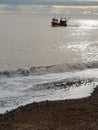 Early morning fishing boat in winter Royalty Free Stock Photo