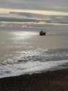 Early morning fishing boat in winter Royalty Free Stock Photo