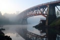 early morning fog over partially built bridge Royalty Free Stock Photo