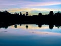 Early Morning Glow: Sunrise silhouette at Angkor Wat, Siem Reap, Cambodia Royalty Free Stock Photo