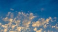 Early morning golden clouds on blue sky