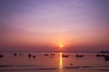 Early morning golden sunrise over the sea. Fishing boats on the sea . Royalty Free Stock Photo