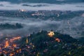 Early morning in historic city Banska Stiavnica in Slovakia with town lights