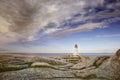 Early morning at Lighthouse at Peggy`s Cove, Nova Scotia, Canada Royalty Free Stock Photo