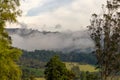 Early in the morning low clouds cover with mist the central Andean mountains