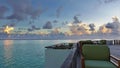 Early morning in the Maldives. There are blue and golden clouds above the horizon. Royalty Free Stock Photo