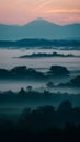 Early morning mist veils the landscape in mystical serenity