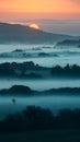 Early morning mist veils the landscape in mystical serenity