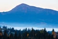 Early morning misty autumn Carpathian mountain village, Ukraine. Royalty Free Stock Photo