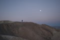 Just before sunrise, man climbs a mountain to meet the sunrise Royalty Free Stock Photo