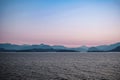 Early morning in the ocean and mountains near Vancouver Island. Beautiful sunrise. Dawn over the sea and mountains Royalty Free Stock Photo