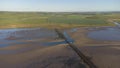 Early morning over the causeway to Holy Island of Lindisfarne, Northumberland Royalty Free Stock Photo