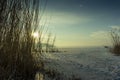 Early in the morning over a frozen lake