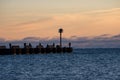 Early morning pier fishing. Royalty Free Stock Photo