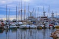 Early morning in port of Monaco. Rows of luxury yachts and different boats moored at the pier. Landscape view of port in Monaco Royalty Free Stock Photo