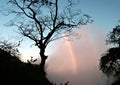Early morning rainbow on Victoria Falls spray Royalty Free Stock Photo