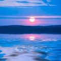 Early morning rising sun reflected in water Royalty Free Stock Photo