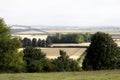 Early morning summer mist over farmland