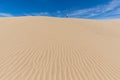 Early Morning Sunlight Over Sand Dunes And Mountains At Mesquite flat dunes, Death Valley National Park, California USA Royalty Free Stock Photo