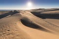 Early Morning Sunlight Over Sand Dunes And Mountains At Mesquite flat dunes, Death Valley National Park, California USA Royalty Free Stock Photo