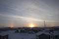 Early morning sunrise in Arviat with a sundog