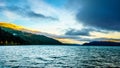 Early Morning Sunrise and Dark Clouds over Harrison Lake Royalty Free Stock Photo